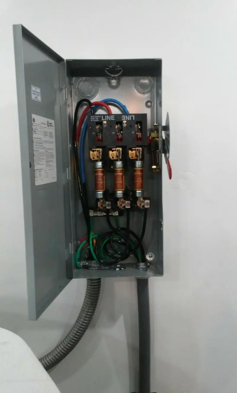Three-phase disconnect switch installed for Smoke Detector Installation in Peters